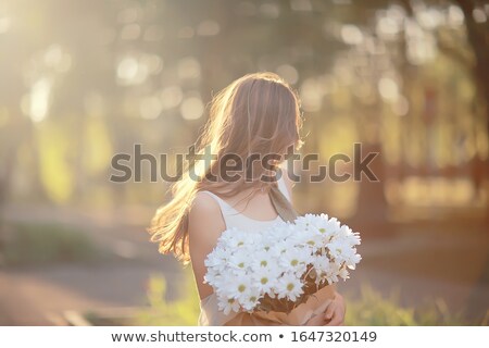 Foto stock: Waiting Pretty Girl With Bouquet