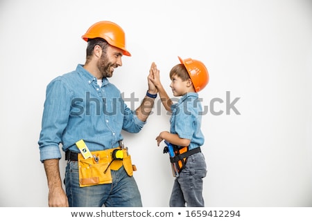 Сток-фото: Craftsman Standing With Instrument