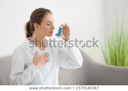 Stock photo: Asthma Woman With Doctor At The Hospital