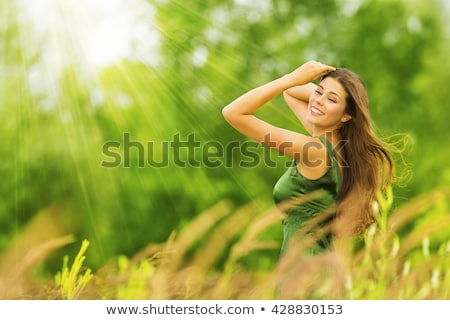 Stock photo: Happy Woman On Green Grass