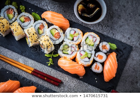 Stock photo: Rolls And Sushi On Plate