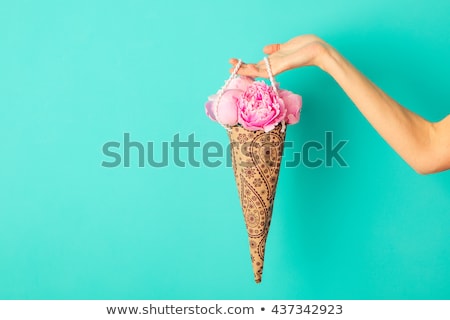 Stock fotó: Bunch Of Peonies Flowers In Female Hand On A Turquoise Wall Background Copy Space