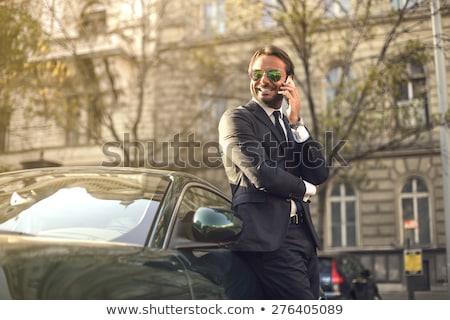 Foto stock: Confident Businessman In Sunglasses