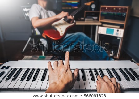 Stok fotoğraf: Two Electric Guitar Players In Studio