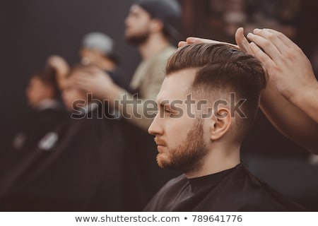 Stock fotó: Barber Grooming The Clients Hair