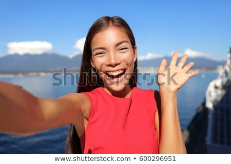 Asian Woman Talking On Video Chat Mobile Phone App Or Taking Selfie Photo For Social Media Young Bu Stockfoto © Maridav