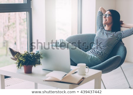 Foto stock: Beautiful Woman Relaxing Time In The Office
