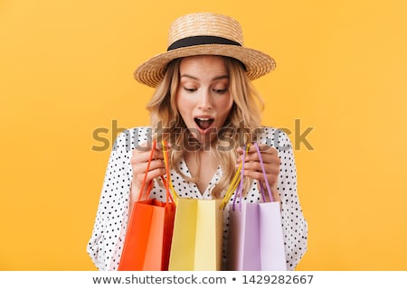 Сток-фото: Portrait Of Young Excited Pretty Woman Standing Inside Shopping