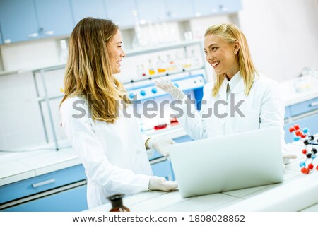 Stockfoto: Chemist Working At A Laptop Computer