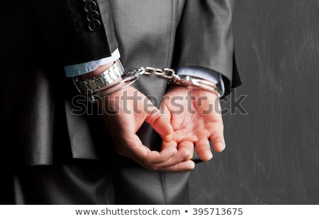 Stock foto: Rear View Of Businessman In Handcuffs