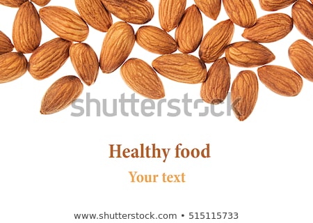 Stok fotoğraf: Nuts Border Of Almonds On White Background Pile Of Selected Almond Close Up