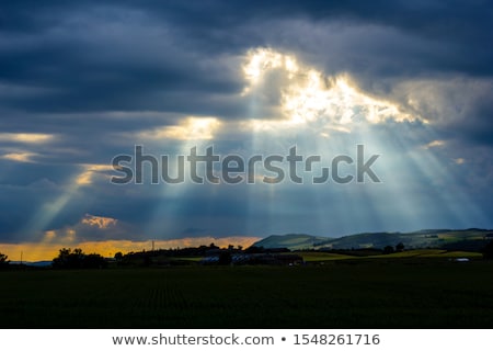 Sun Rays Through Storm Clouds ストックフォト © Julietphotography