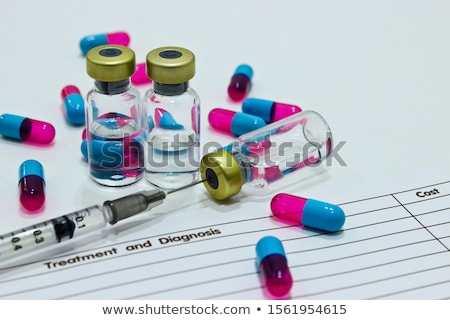 Zdjęcia stock: Medical Syringe And Vials Is In A One Use Capsule