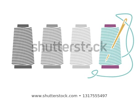 Stock photo: Spool Of Thread With A Needle