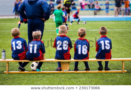 Kids Soccer Team Waiting On The Bench Stockfoto © matimix