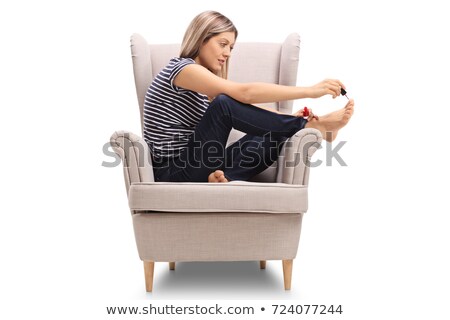 Stock photo: Beautiful Woman Polishing Her Nails