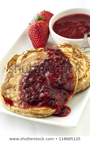 Stock fotó: Buckwheat Pancakes With Berry Coulis
