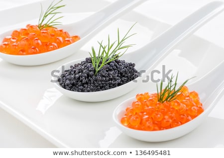 Stockfoto: Red And Black Caviar On Porcelain Spoons