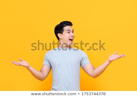Stock fotó: Happy Asian Man With Arm Out In A Welcoming Gesture