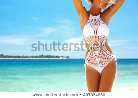 Stock photo: Woman In White Bikini Swimsuit On Tropical Beach