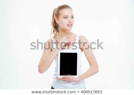 Сток-фото: Pensive Woman Showing Blank Tablet Computer Screen