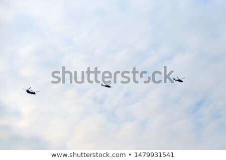 Stock fotó: Three Scenes Of Airplane Flying At Daytime
