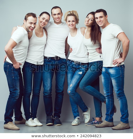 Young Beautiful Couple Posing Wearing Jeans And T Shirt Stock photo © Augustino