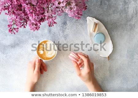 Stock photo: Close Up Of Colorful Macaron Macaroon On The Table With Hot Te