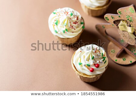 Foto d'archivio: Christmas Festive Cupcake With Different Decorations