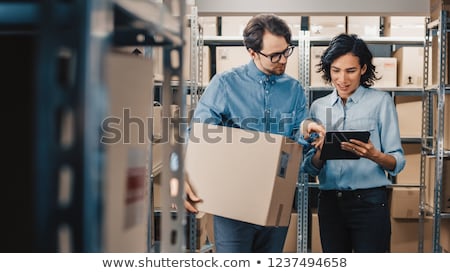 [[stock_photo]]: Warehouse Manager Checking The Inventory