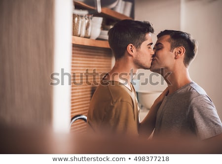 Stockfoto: Two Young Gay Men Kissing