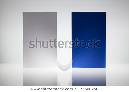 Stok fotoğraf: Symmetry Abstract Paper Background On A Glass Table