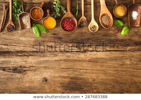 Foto d'archivio: Culinary Background With Spices On Wooden Table
