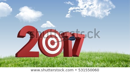 Stok fotoğraf: Composite Image Of Numbers With Bulls Eye Arrow