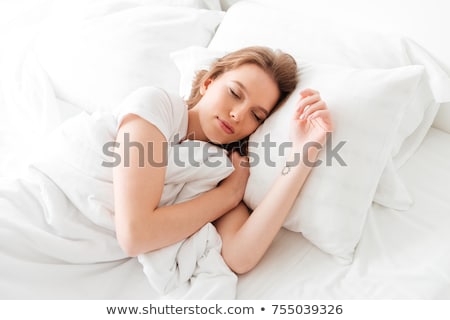 Foto stock: Ujer · acostada · en · la · cama · durmiendo