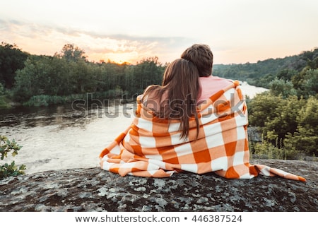Stok fotoğraf: Couple In Blanket Kissing