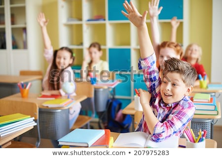 Kid Boy Raising Hand Stockfoto © Pressmaster