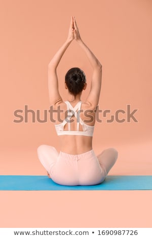 Stockfoto: Relaxed Woman Sitting In Lotus Position