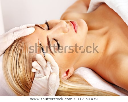 Stock photo: Doctor Giving Facial Skin Lifting Injection On Womans Face