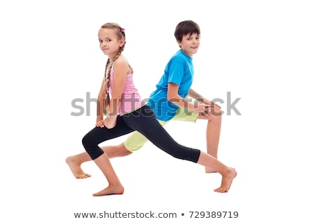 Сток-фото: Kids Doing Leg Strengthening And Flexibility Exercises