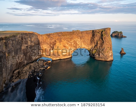 Stockfoto: Amazing Black Arch Of Lava Standing In The Sea Location Cape Dy