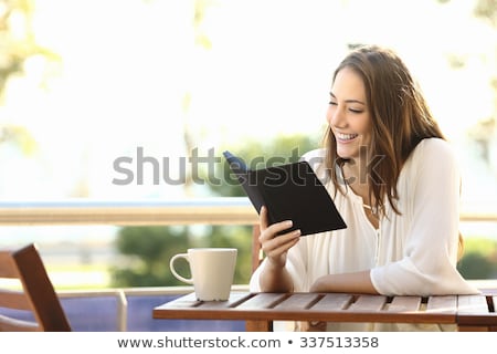 Сток-фото: Happy Woman With Books Coffee And Ebook