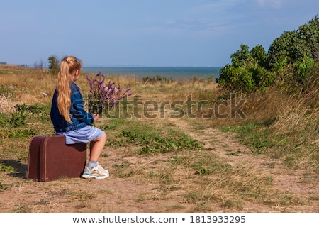 Stockfoto: Lonely Girl With Suitcase