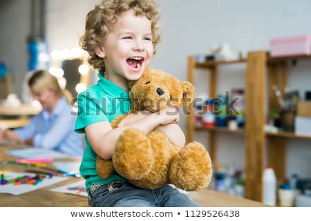 ストックフォト: Cheerful Blonde With Teddy Bear