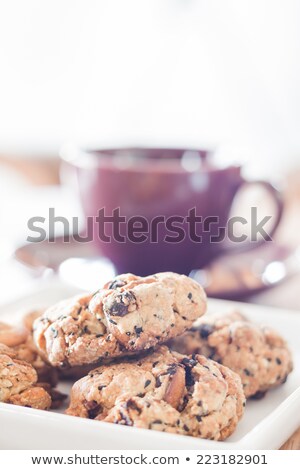 Closeup Cereal Cookies With Violet Coffee Cup Foto d'archivio © punsayaporn