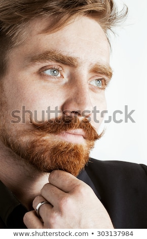 Stockfoto: Young Red Hair Man With Beard And Mustache In Black Suit On Whit