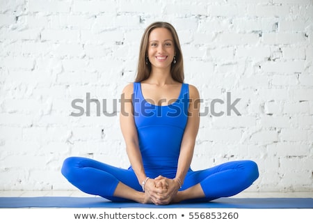 Сток-фото: Young Cheerful Attractive Woman Practicing Yoga