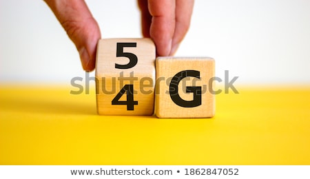 Сток-фото: Hand Changing Wooden Block From 4g To 5g