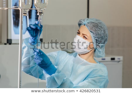 [[stock_photo]]: Doctor And Nurse With Iv Drip