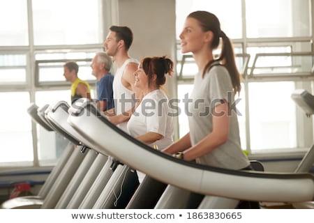 Zdjęcia stock: Mature Woman Using A Treadmill